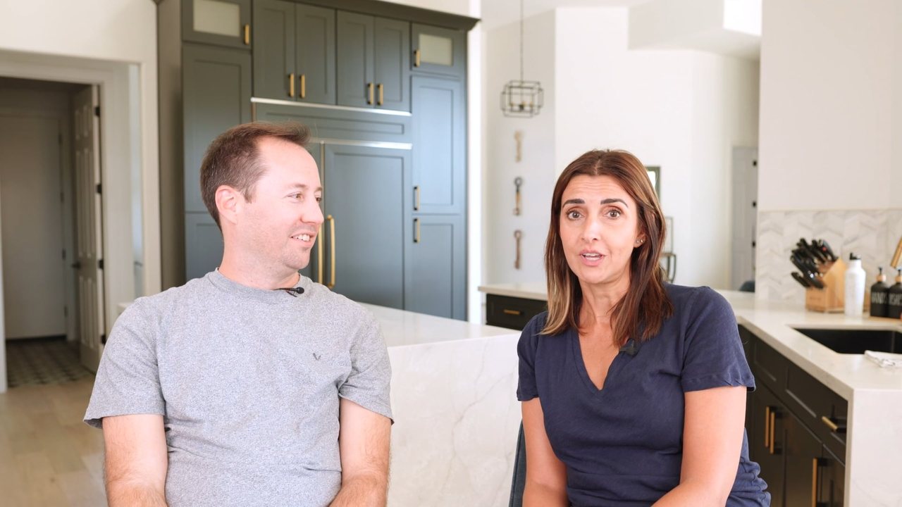 Rikki Kopack and David seated in their living room during their filmed testimonial